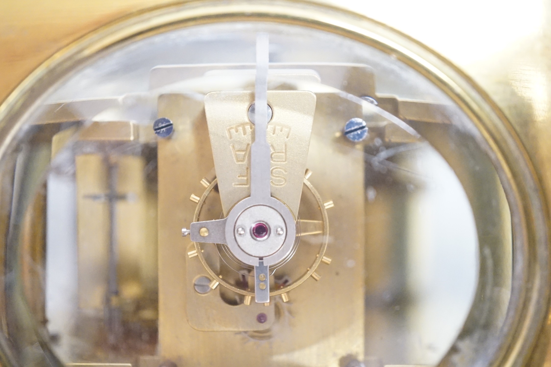 Two English brass carriage clocks with winding keys. Tallest 14.5cm